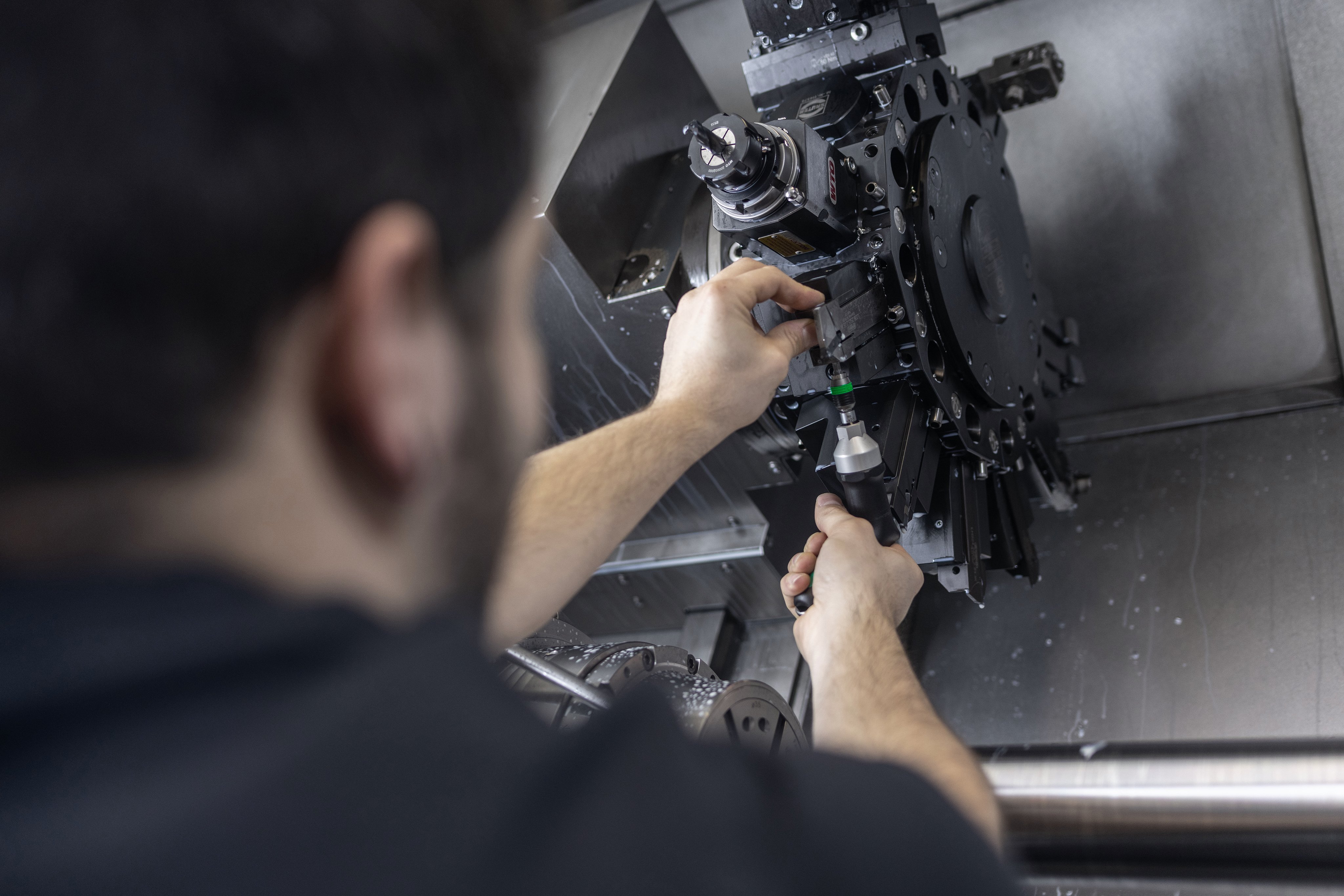 krug-priest-home-careers-production-man-machine